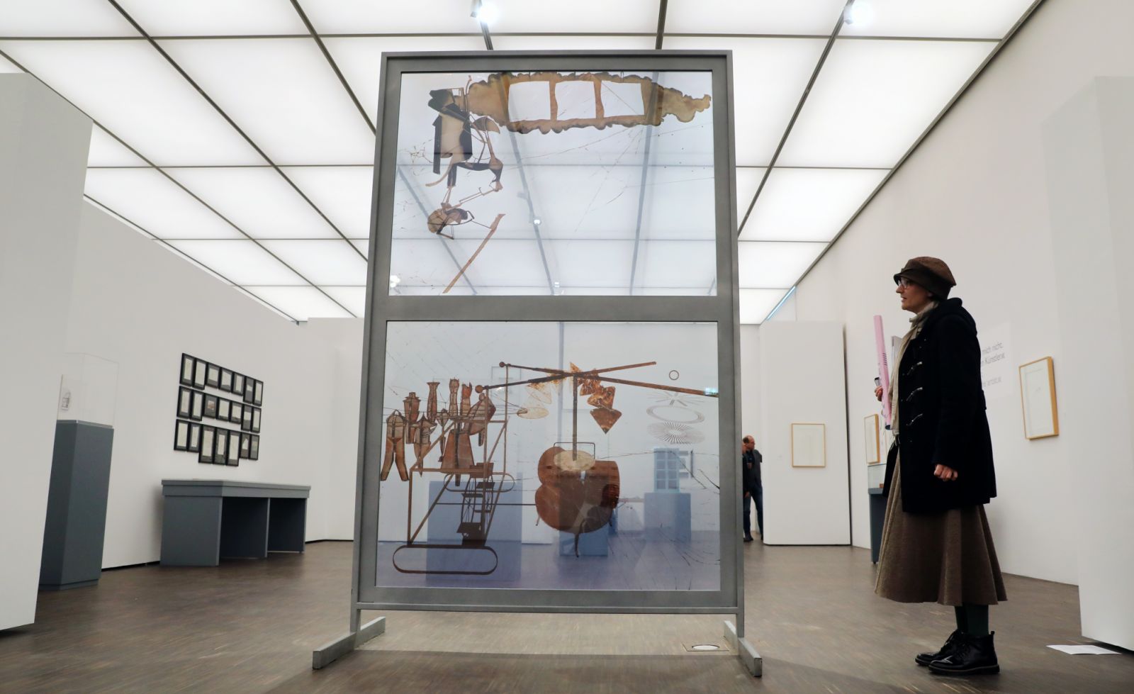 27 March 2019, Mecklenburg-Western Pomerania, Schwerin: At a press conference to present the new exhibition "Marcel Duchamp: Seeing the Impossible" at the Staatliches Museum Schwerin, the version "Large Glass", an authorized reproduction that the art dealer Ronny Van de Velde had made in 1991 for an exhibition "Marcel Duchamp" in his gallery in Antwerp, is presented. On the occasion of the 10th anniversary of the Duchamp Research Centre 2019 in the Staatliches Museum Schwerin, the artist will be honoured wi