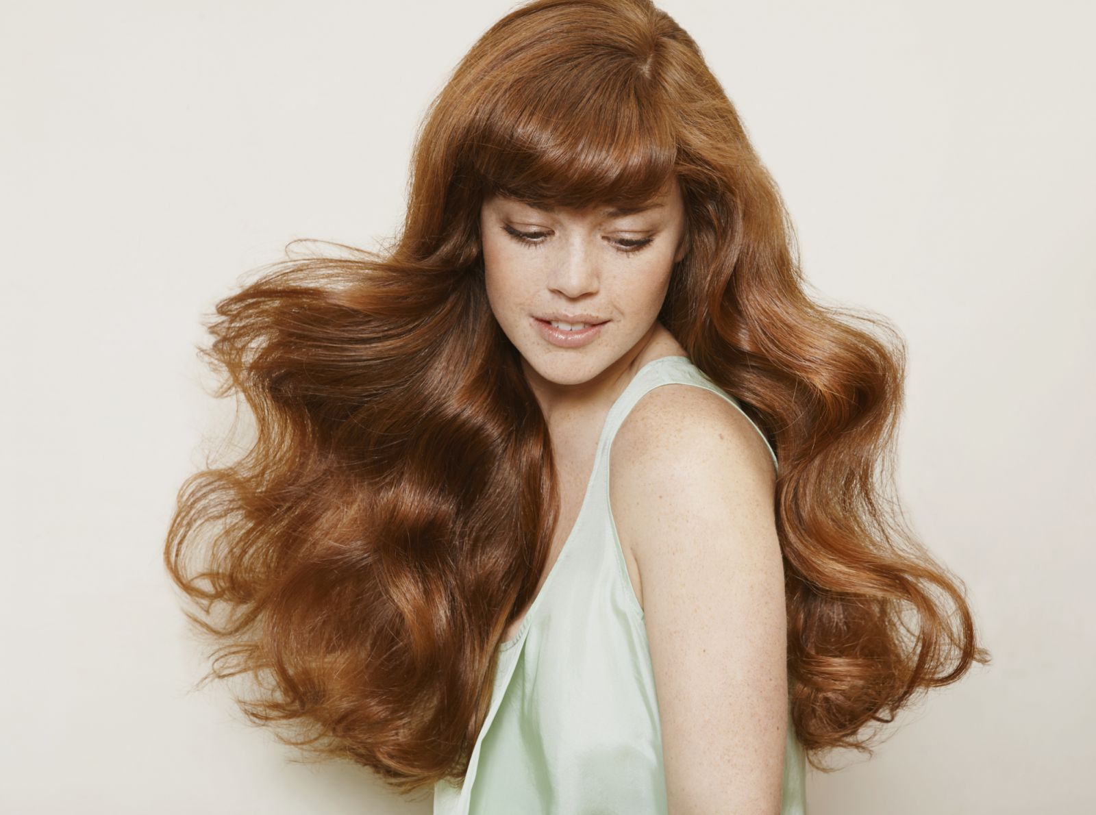 woman with wavy red hair