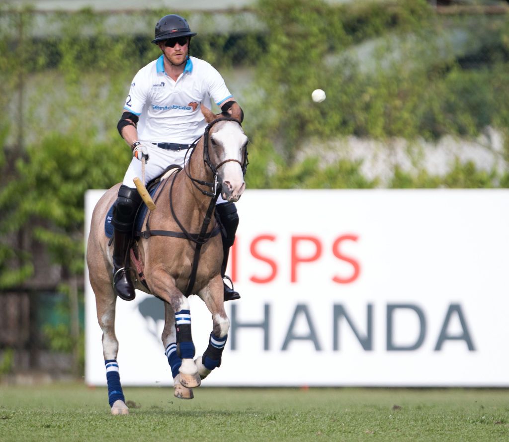 Prince Harry takes part in the Sentebale Royal Salute Polo Cup at the Singapore Polo Club. (Photo by Steve Parsons/PA Images via Getty Images)