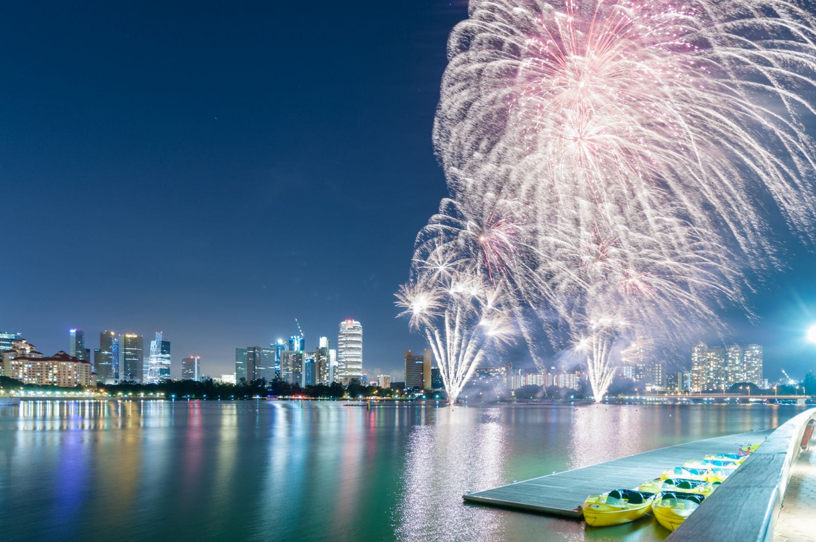 fireworks by water at water Sports center in Singapore city