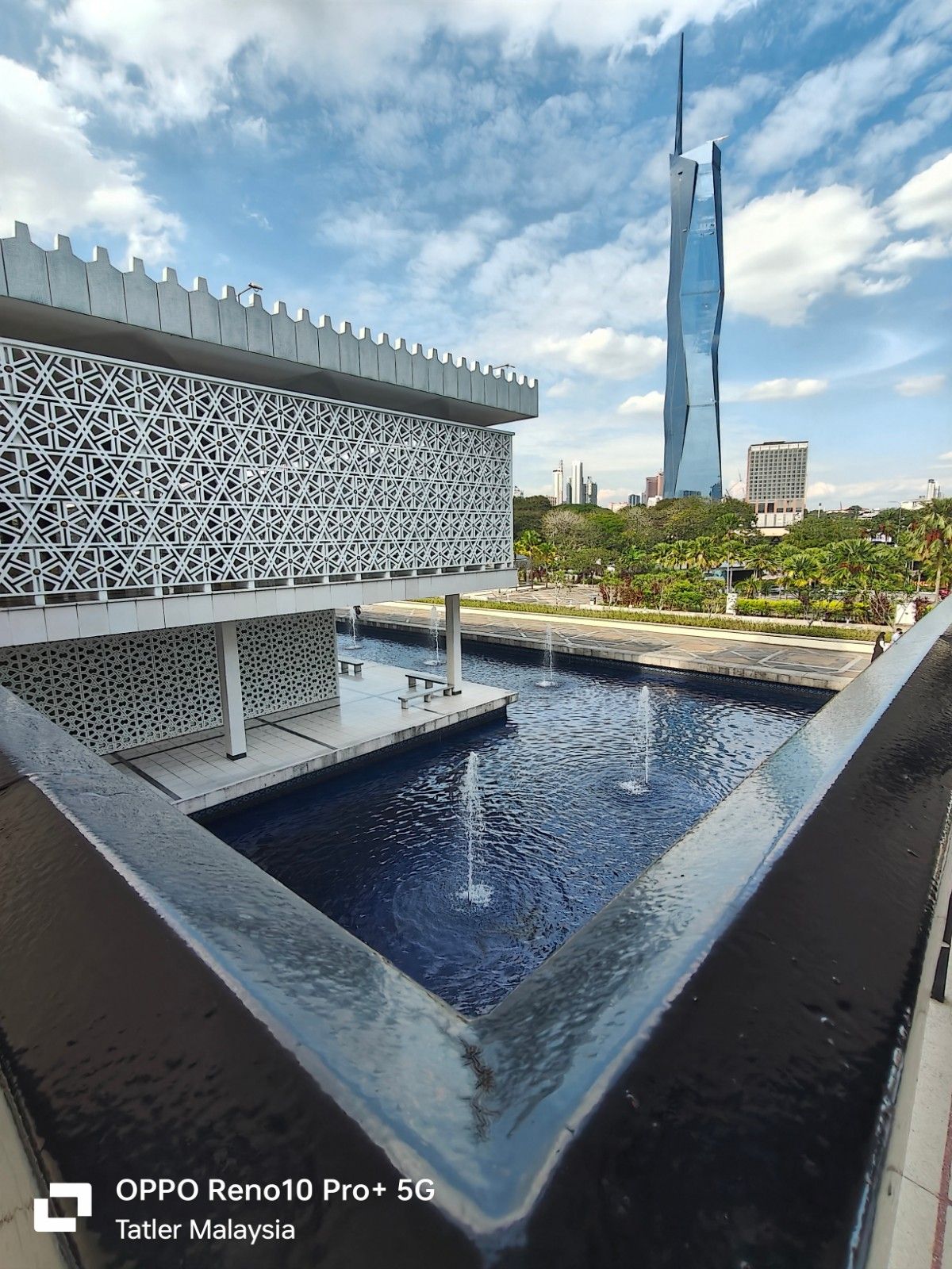 The calm serene surroundings of the National Mosque stands in contrast with the modern skyline of Kuala Lumpur (Photos: Chong Jinn Xiung)