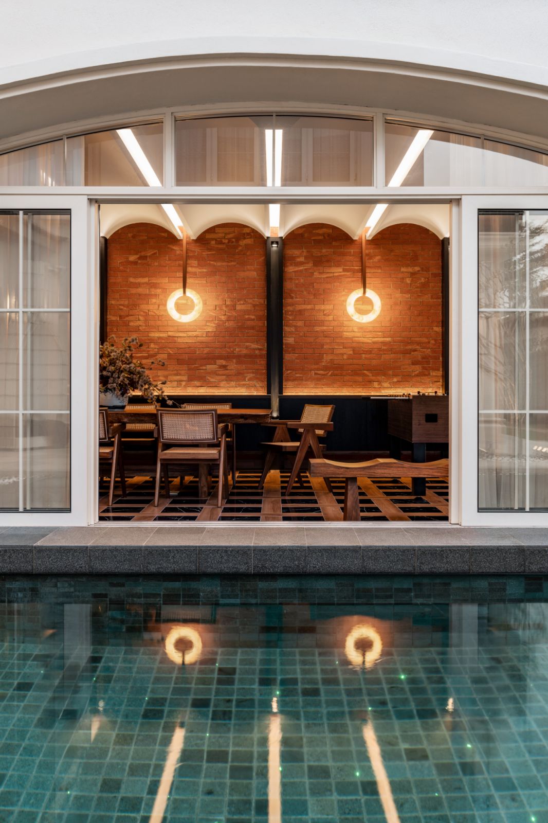 The dining room has a beautiful view of the pool