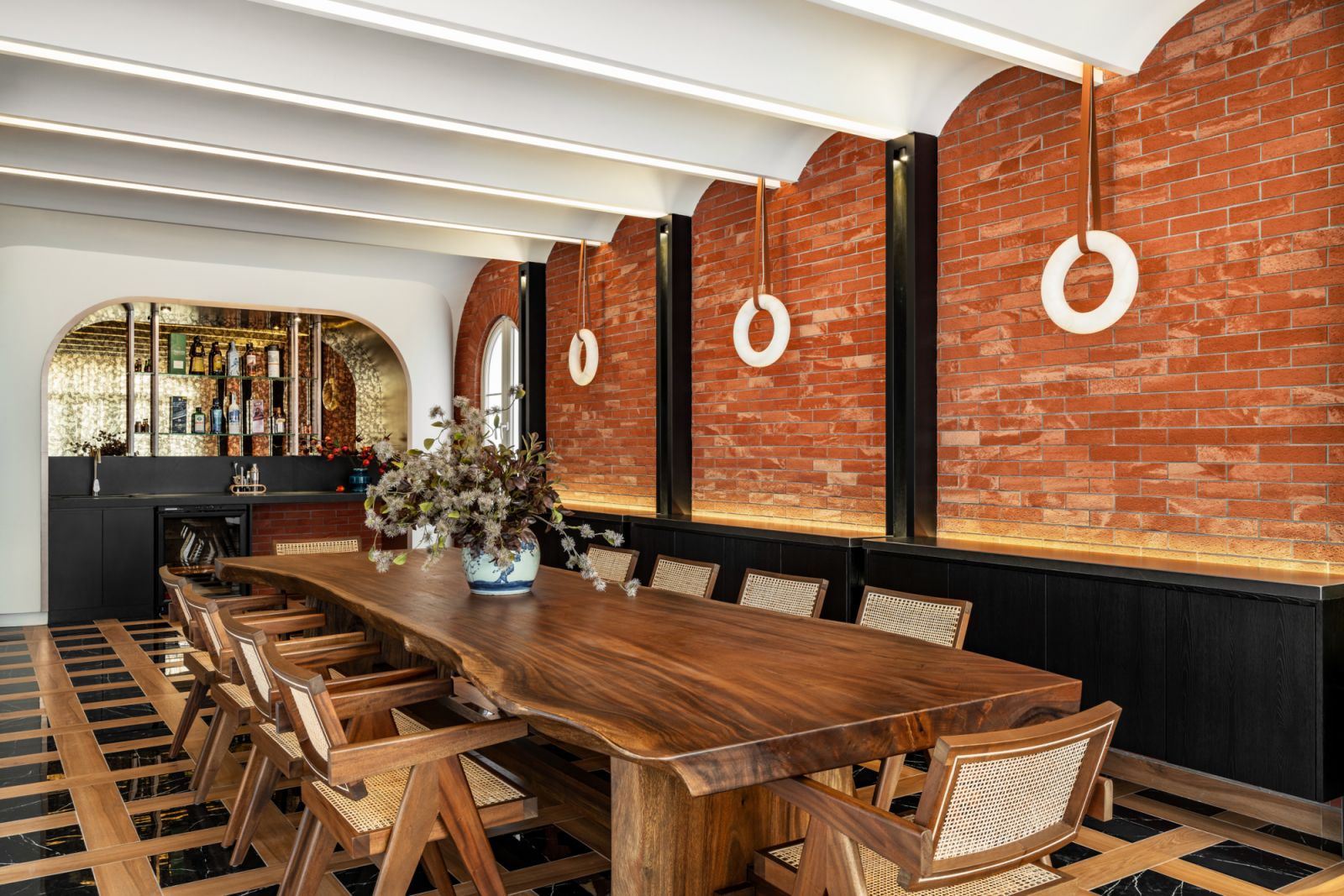The handsome dining room is welcoming yet impressive