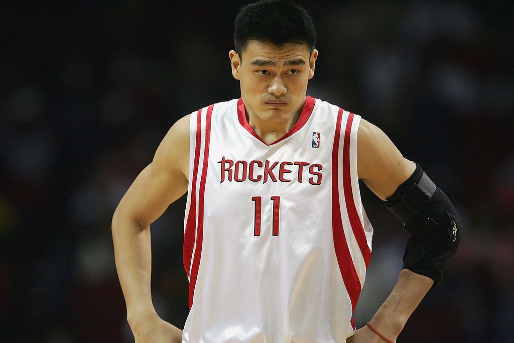 HOUSTON - DECEMBER 11: Yao Ming #11 of the Houston Rockets rests during the game against the Dallas Mavericks on December 11, 2004 at the Toyota Center in Houston, Texas. The Mavericks won 102-78. NOTE TO USER: User expressly acknowledges and agrees that, by downloading and/or using this Photograph, User is consenting to the terms and conditions of the Getty Images License Agreement.(Photo by: Harry How/Getty Images)