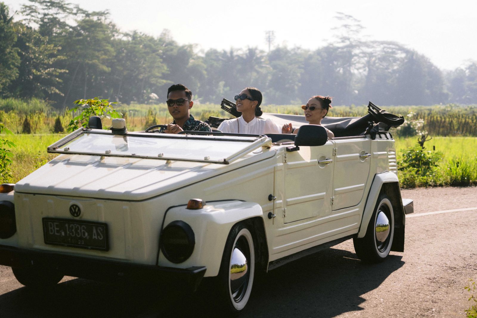 Sophia Liana and Maria Rahajeng taking in the view during a cultural tour around the villages surrounding Borobudur on a vintage Volkswagen