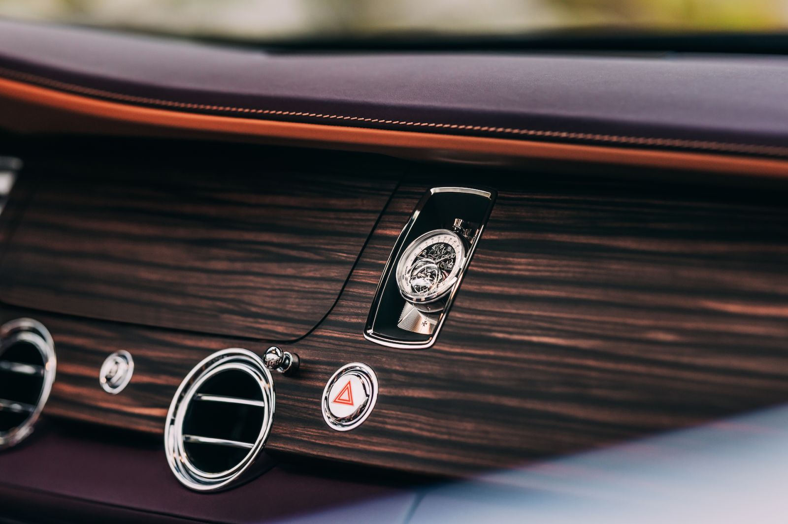 A special holder had to be created for the watch for it to fit on the dashboard