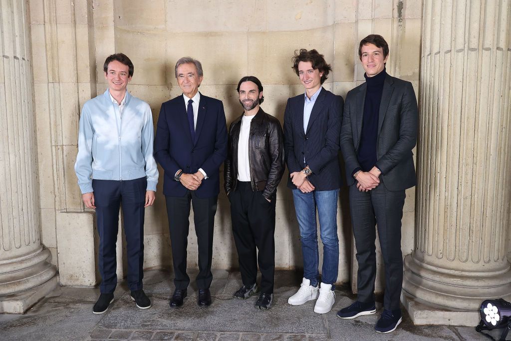 PARIS, FRANCE - OCTOBER 04: (EDITORIAL USE ONLY - For Non-Editorial use please seek approval from Fashion House) (L-R) Frédéric Arnault, Bernard Arnault, designer Nicolas Ghesquière, Jean Arnault and Alexandre Arnault pose backstage after the Louis Vuitton Womenswear Spring/Summer 2023 show as part of Paris Fashion Week on October 04, 2022 in Paris, France. (Photo by Marc Piasecki/WireImage)