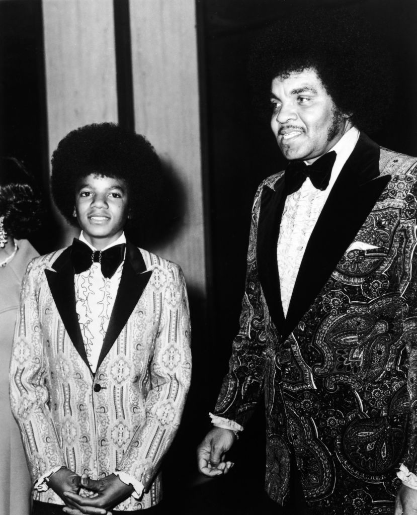 American singer Michael Jackson and his father Joe Jackson pose at the Golden Globe Awards, 1973. (Photo by Frank Edwards/Fotos International/Getty Images)