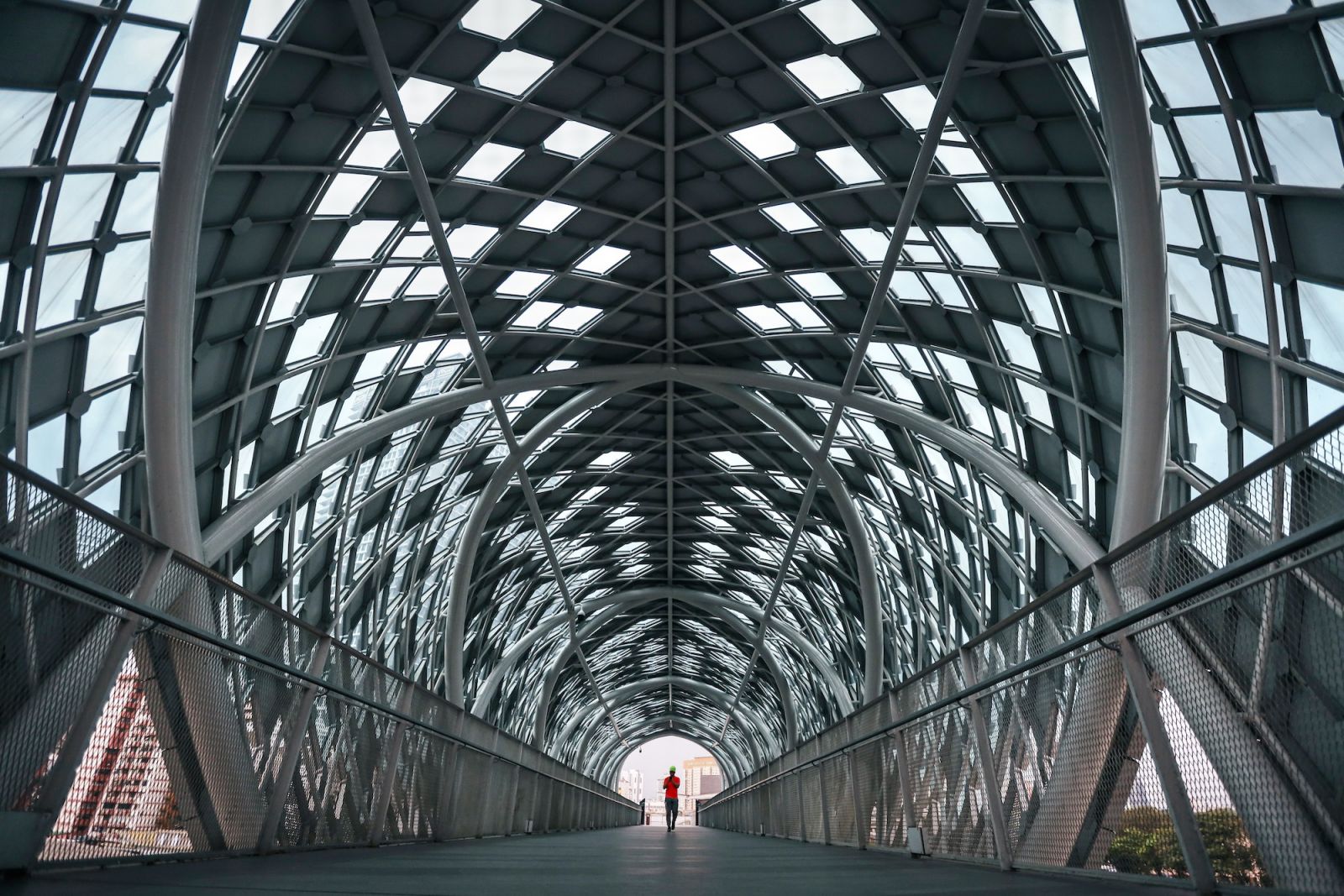 KUALA LUMPUR, MALAYSIA - 2021/01/15: A man walks through an empty Saloma Link bridge (Photo: Annice Lyn/SOPA Images/LightRocket via Getty Images)