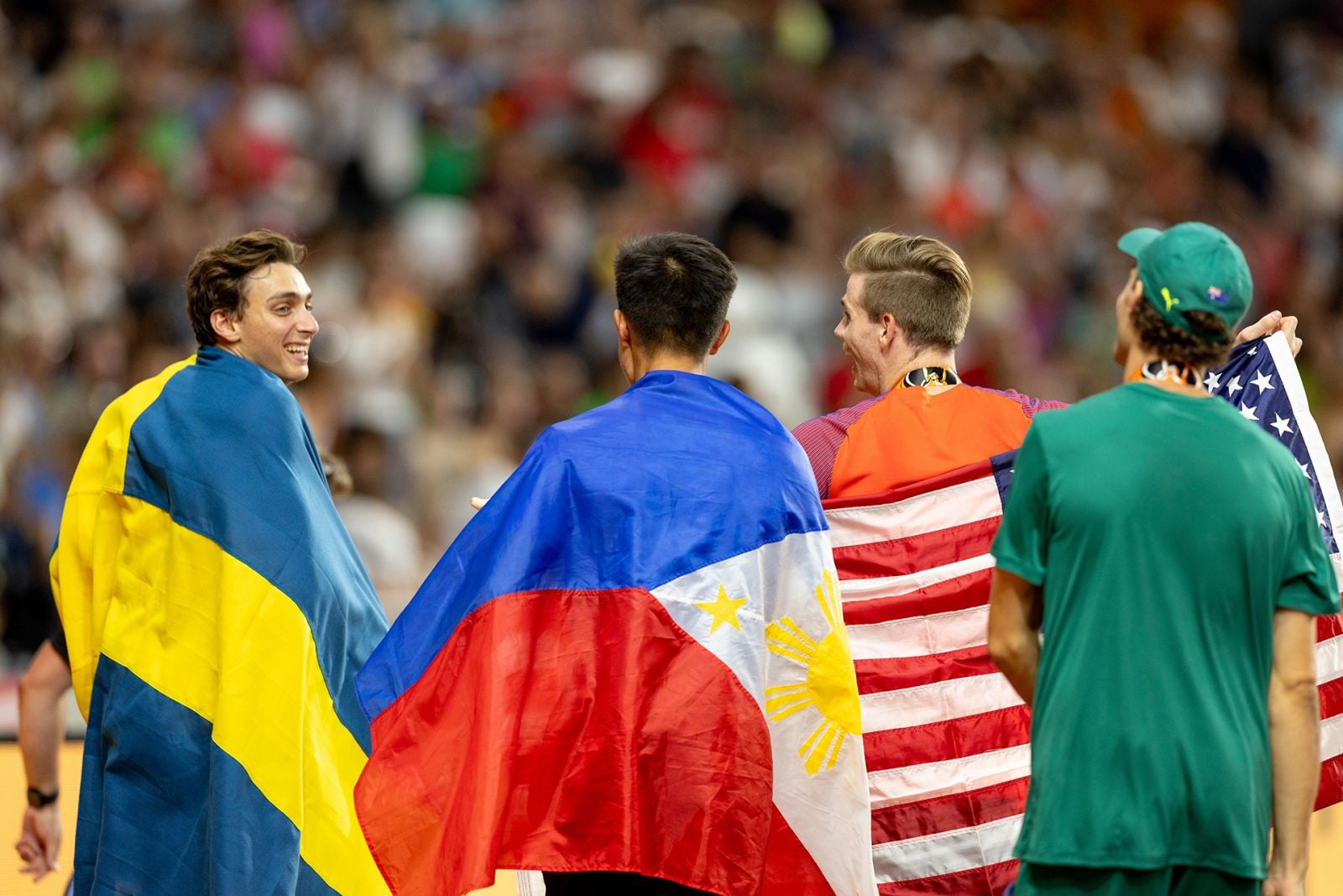 BUDAPEST, HUNGARY - AUGUST 26: (L-R) Gold medalist Armand Duplantis, silver medalist Ernest John Obiena and joint bronze medalists Christopher Nilsen and Kurtis Marschall following the Men's Pole Vault Final during day eight of the World Athletics Championships Budapest 2023 at National Athletics Centre on August 26, 2023 in Budapest, Hungary. (Photo by Sam Mellish/Getty Images)