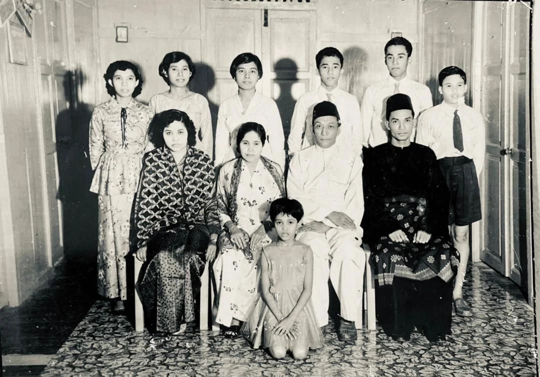 A young Munirah Hamid (front and centre) with her family (Photo: Courtesy of Baida Hercus)