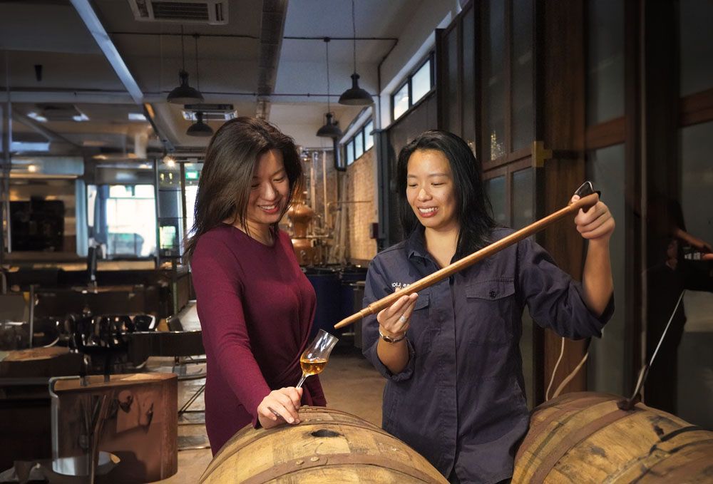 Tasting the spirit straight from the bourbon cask