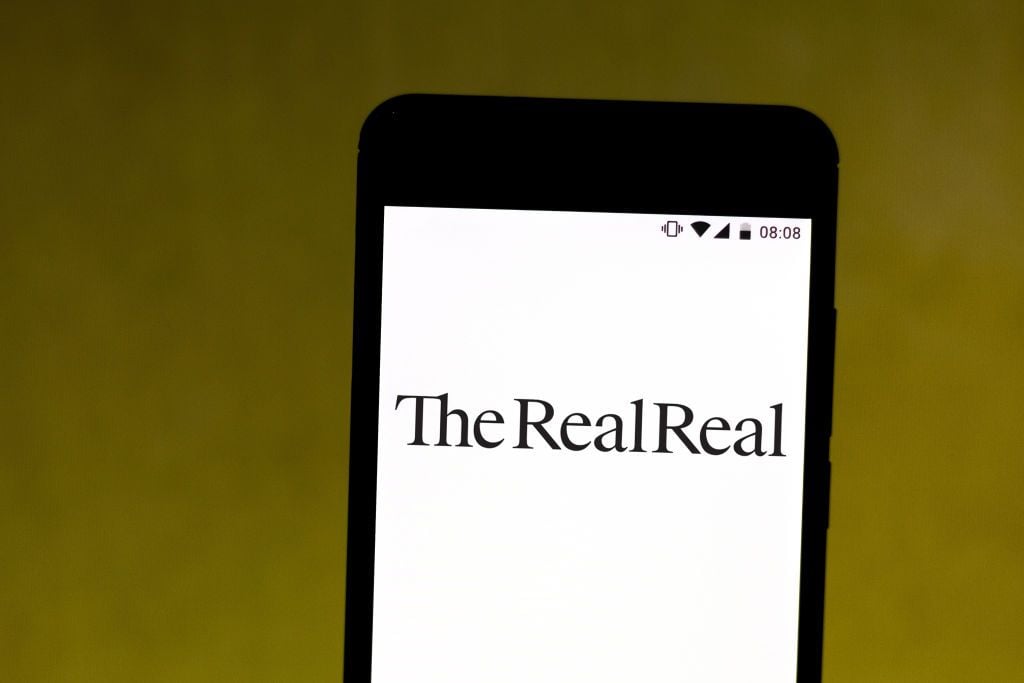 BRAZIL - 2019/07/08: In this photo illustration The RealReal logo seen displayed on a smartphone. (Photo Illustration by Rafael Henrique/SOPA Images/LightRocket via Getty Images)