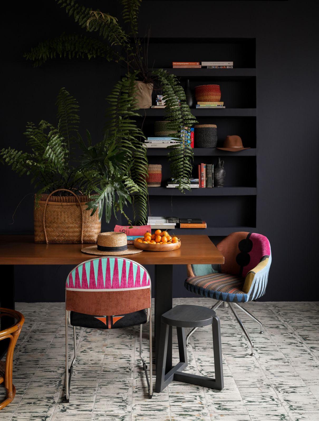 Bunag has always been comfortable with high-contrast compositions; mixing dark and light, old and new, pastels and neons, synthetic and organic, as shown in this corner of her home