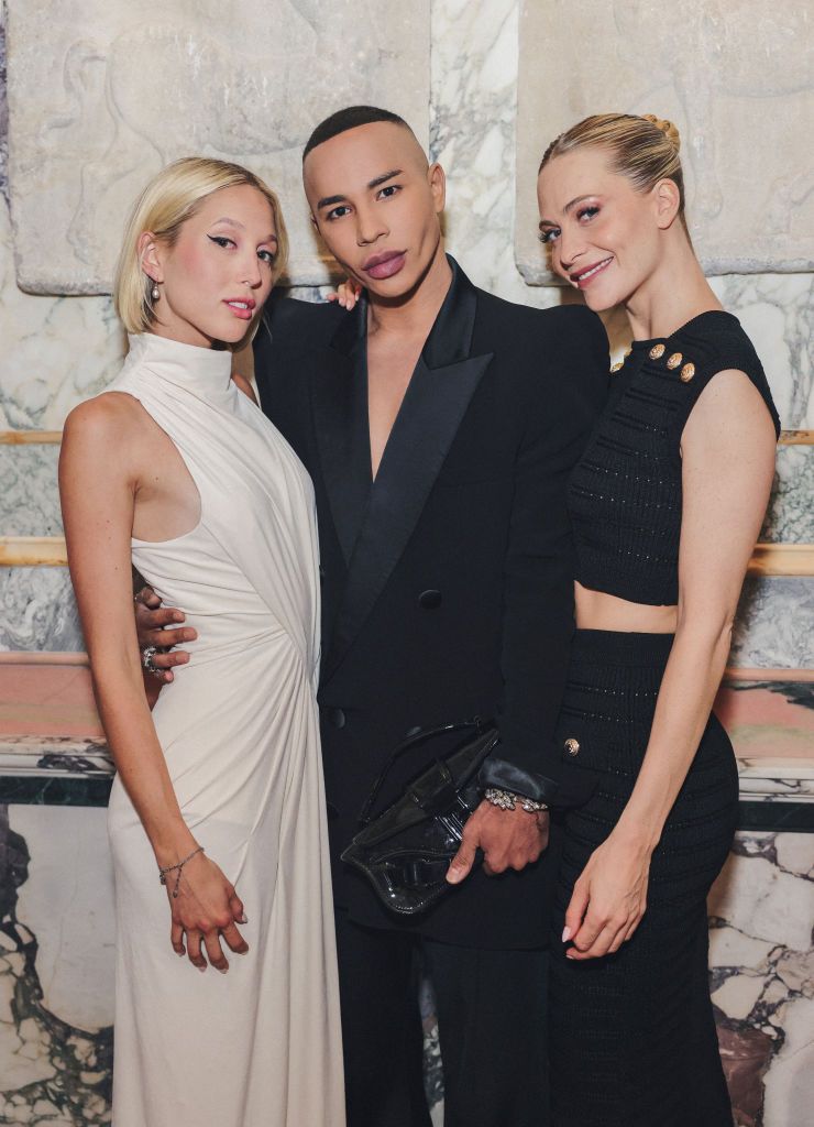 LONDON, ENGLAND - MARCH 30: (EDITORS NOTE: This image was retouched and altered with digital filters.) (L to R) Princess Maria-Olympia of Greece and Denmark, Olivier Rousteing and Poppy Delevingne attend a dinner hosted by Olivier Rousteing to mark the opening of Balmain's new London boutique, held at Apollo's Muse on March 30, 2023 in London, England. (Photo by Dave Benett/Getty Images for Balmain)