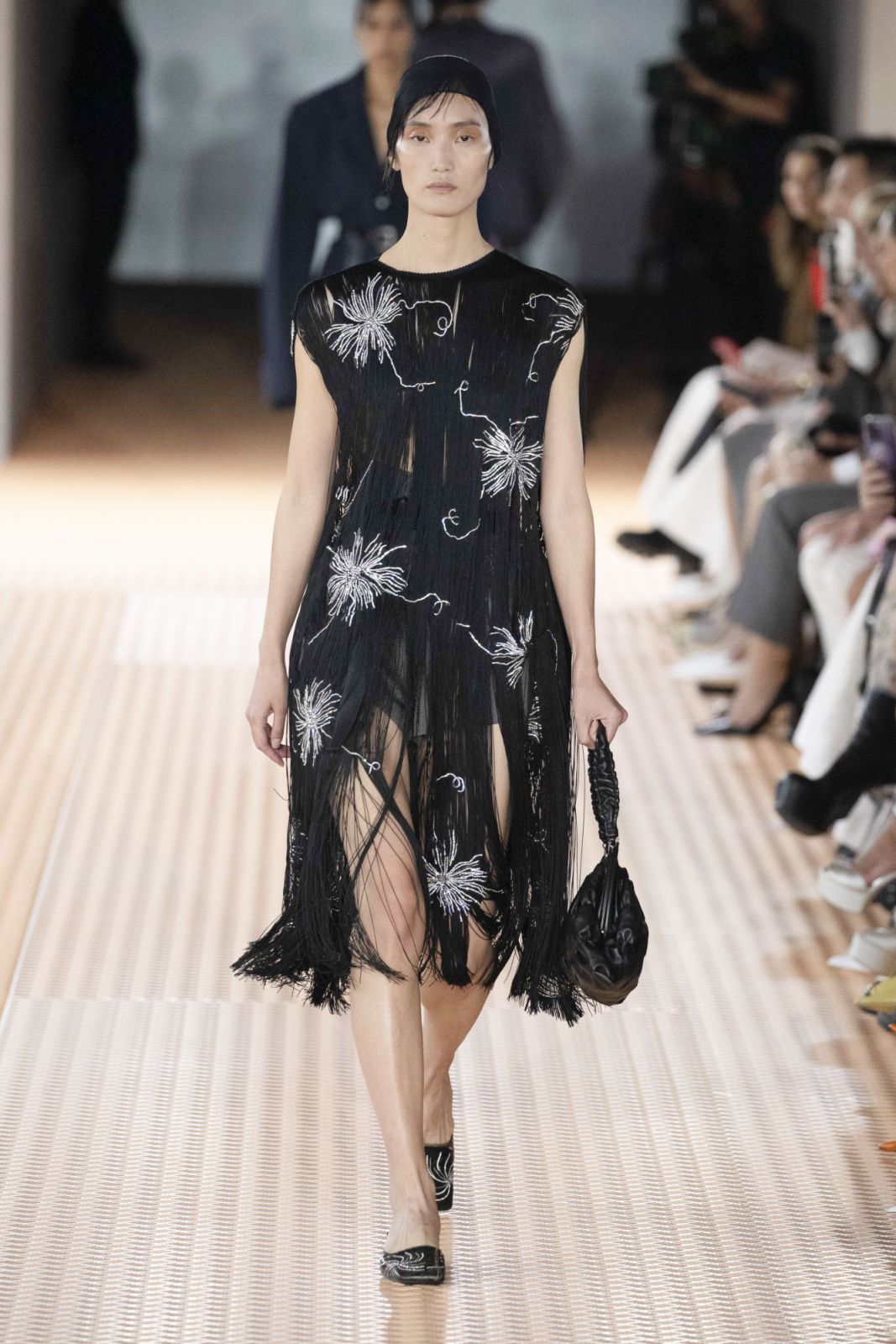 MILAN, ITALY - SEPTEMBER 21: A model walks the runway during the Prada Ready to Wear Spring/Summer 2024 fashion show as part of the Milan Fashion Week on September 21, 2023 in Milan, Italy. (Photo by Victor VIRGILE/Gamma-Rapho via Getty Images)