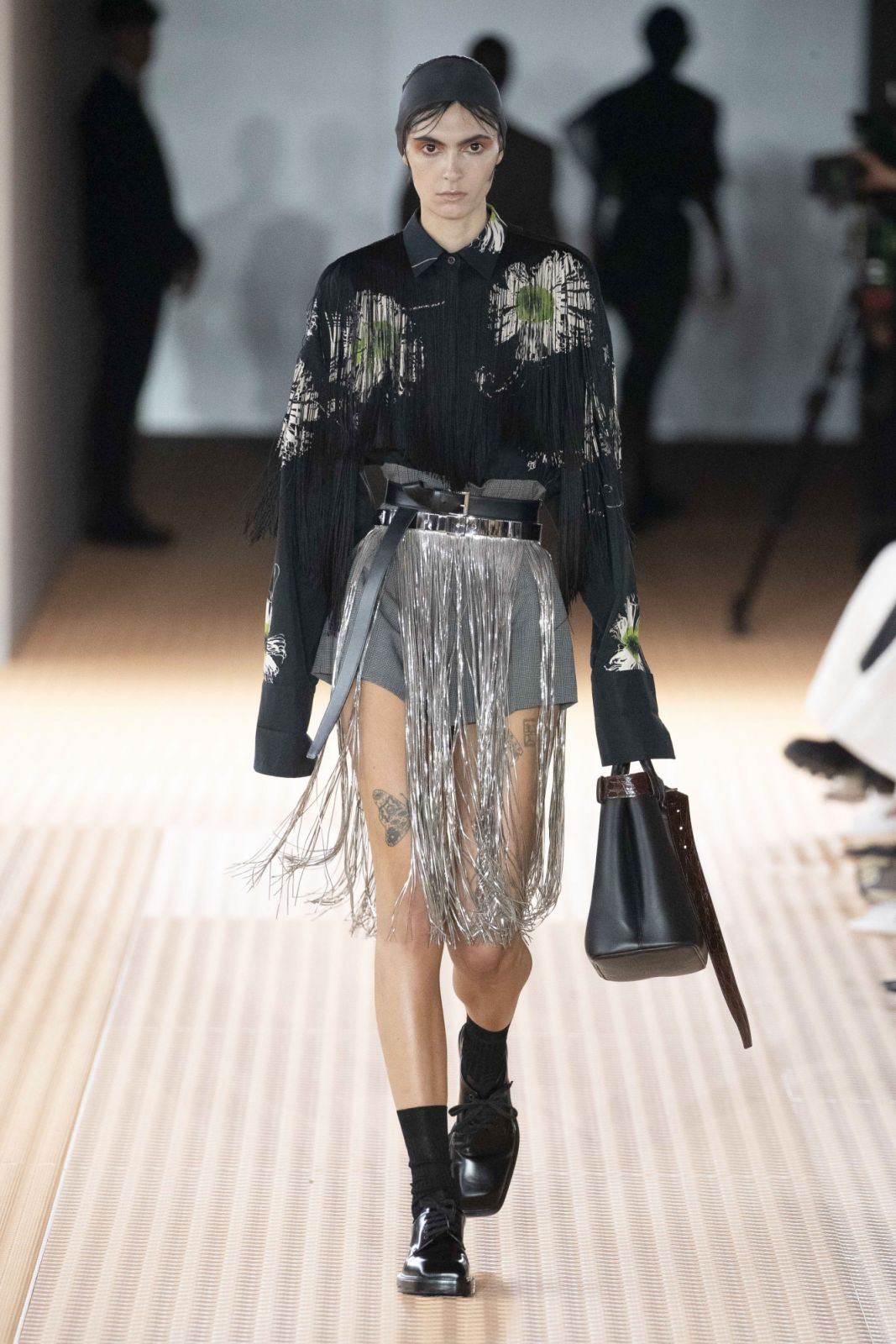 MILAN, ITALY - SEPTEMBER 21: A model walks the runway during the Prada Ready to Wear Spring/Summer 2024 fashion show as part of the Milan Fashion Week on September 21, 2023 in Milan, Italy. (Photo by Victor VIRGILE/Gamma-Rapho via Getty Images)