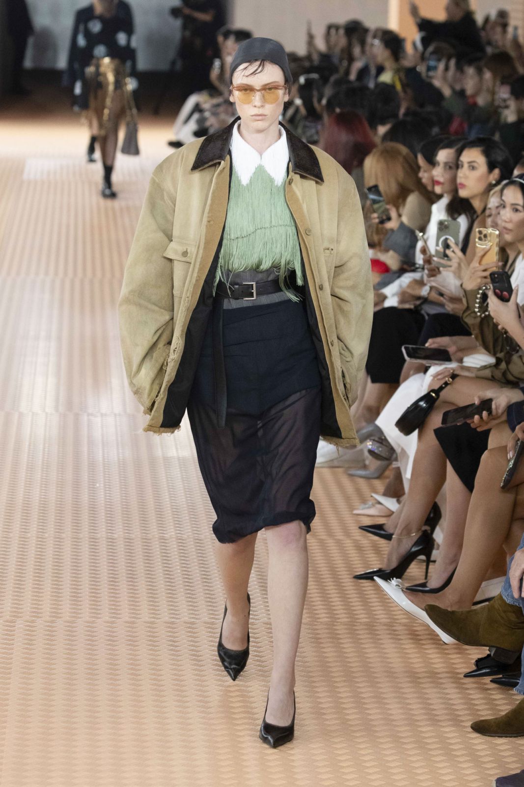 MILAN, ITALY - SEPTEMBER 21: A model walks the runway during the Prada Ready to Wear Spring/Summer 2024 fashion show as part of the Milan Fashion Week on September 21, 2023 in Milan, Italy. (Photo by Victor VIRGILE/Gamma-Rapho via Getty Images)