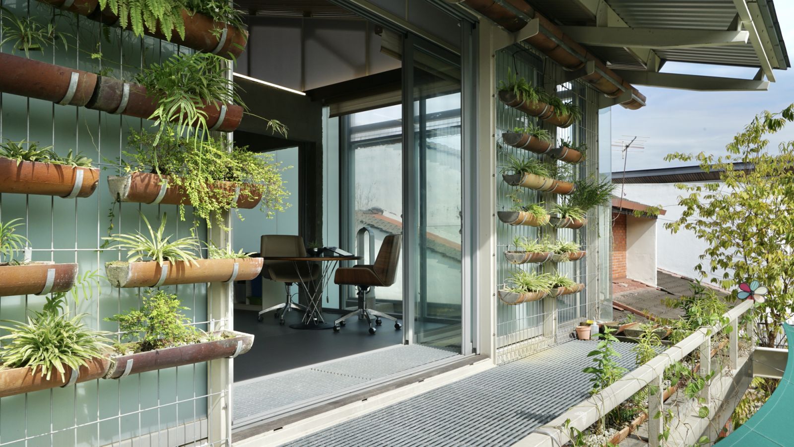 Planter boxes are placed near openings to help channel air inside