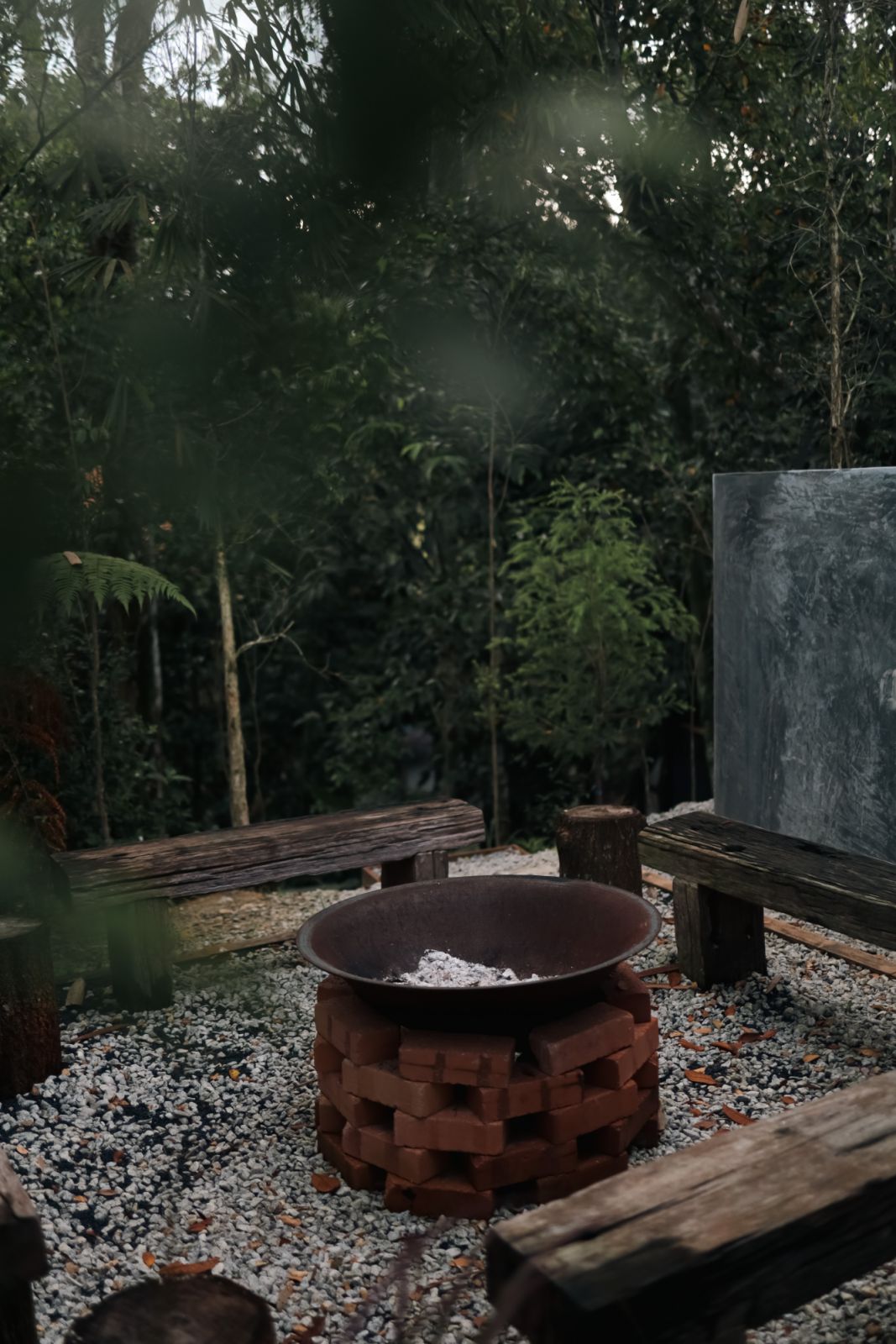 The firepit is a nod to Scandinavian cabin