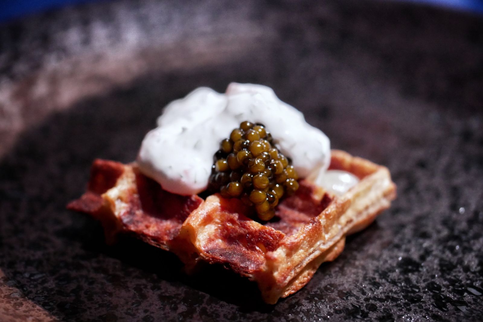 Buckwheat waffle with Kaviari Kristal caviar and a smoked salmon cream by Chef Kobayashi