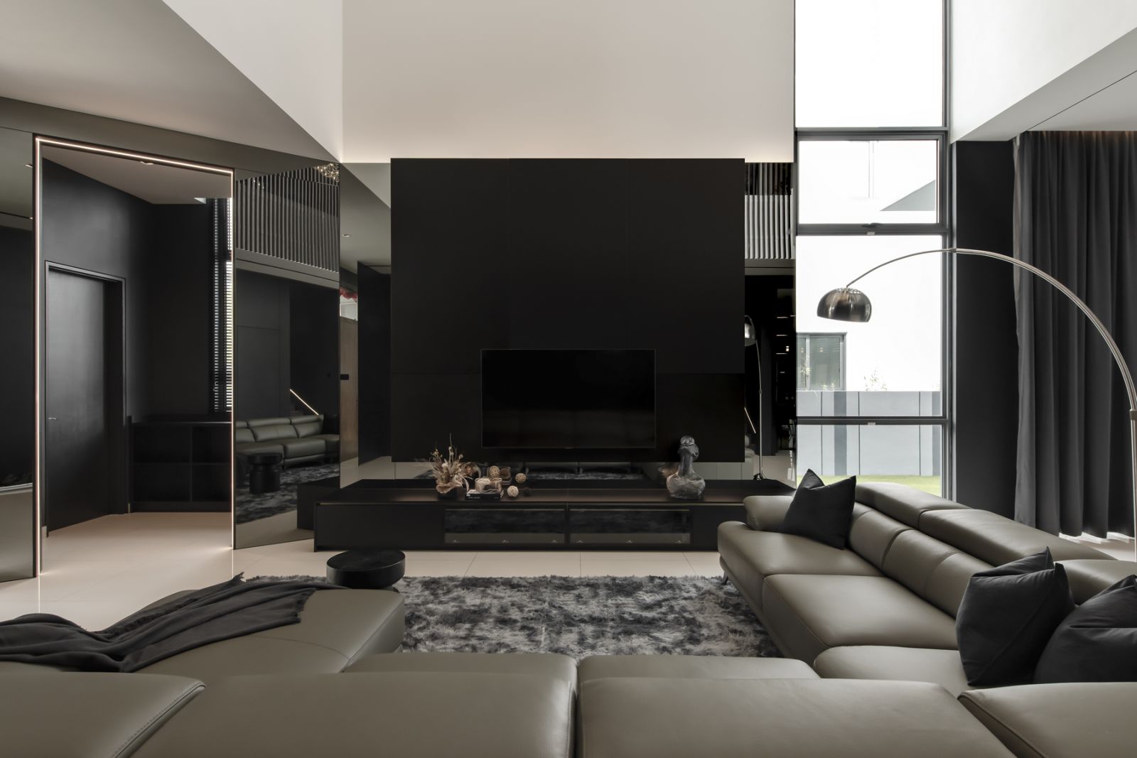 Mirrored walls give the illusion of space, providing even more depth to this sizeable home