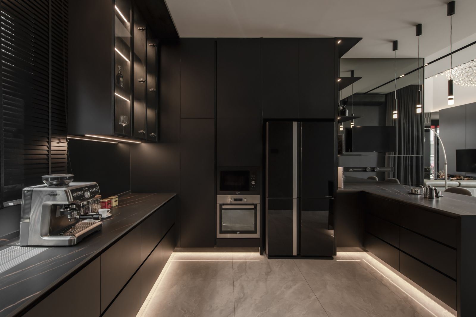 Black cabinetry and white flooring provide a clean finish and easy maintenance