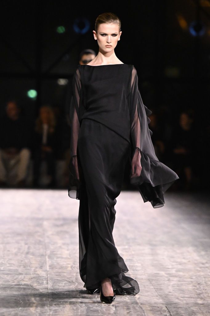PARIS, FRANCE - SEPTEMBER 26: (EDITORIAL USE ONLY - For Non-Editorial use please seek approval from Fashion House) A model walks the runway during the Saint Laurent Womenswear Spring/Summer 2024 show as part of Paris Fashion Week on September 26, 2023 in Paris, France. (Photo by Stephane Cardinale - Corbis/Corbis via Getty Images)