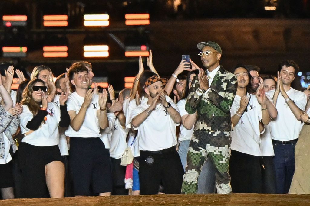 PARIS, FRANCE - JUNE 20: (EDITORIAL USE ONLY - For Non-Editorial use please seek approval from Fashion House) Fashion designer and singer Pharrell Williams walks the runway during the Louis Vuitton Menswear Spring/Summer 2024 show as part of Paris Fashion Week on June 20, 2023 in Paris, France. (Photo by Stephane Cardinale - Corbis/Corbis via Getty Images)