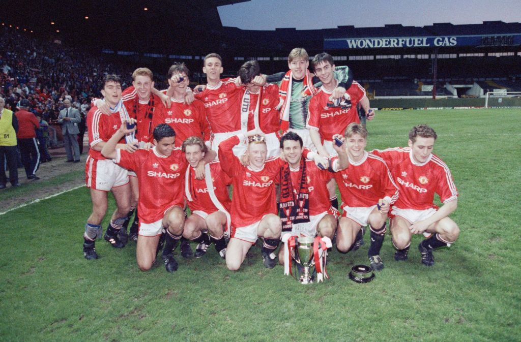 FA Youth Cup Final Second Leg match at Old Trafford. Manchester United 3 v Crystal Palace 2 (united won 6-3 on aggregate). The United team celebrate with the trophy after the match. The team consists of Kevin Pilkington, John O'Kane, George Switzer, Chris Casper, Gary Neville (Captain), David Beckham, Nicky Butt, Simon Davies, Colin McKee, Ryan Giggs, Ben Thornley , Robbie Savage and Keith Gillespie, 15th May 1992. (Photo by Gerry Crowther/Mirrorpix/Getty Images)