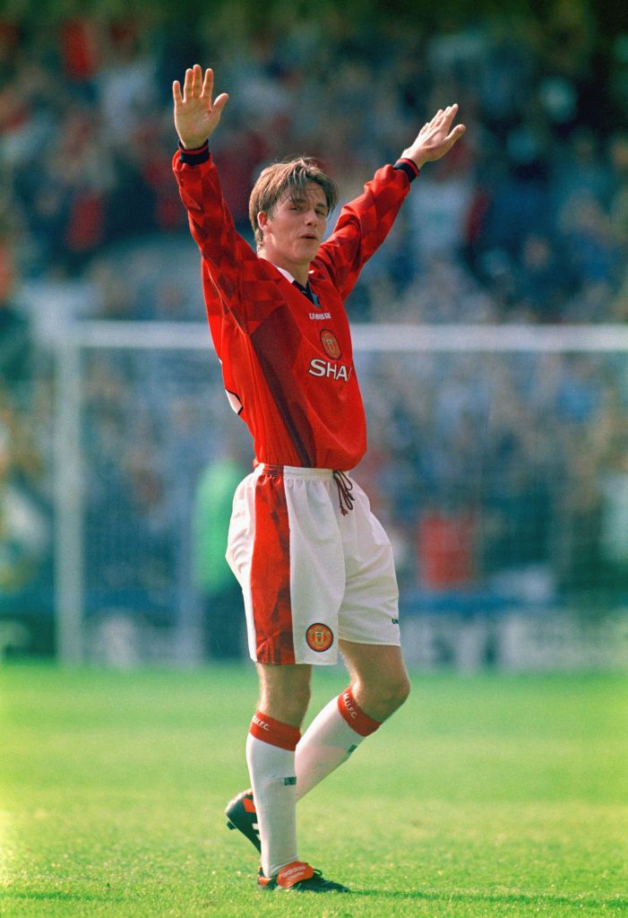 LONDON, UNITED KINGDOM - AUGUST 17: Manchester United player David Beckham celebrates after scoring the third goal with a spectacular effort from the halfway line, during the Premier League match between Wimbledon and Manchester United at Selhurst Park on August 17, 1996 in London, England. (Photo by Michael Cooper/Allsport/Getty Images)
