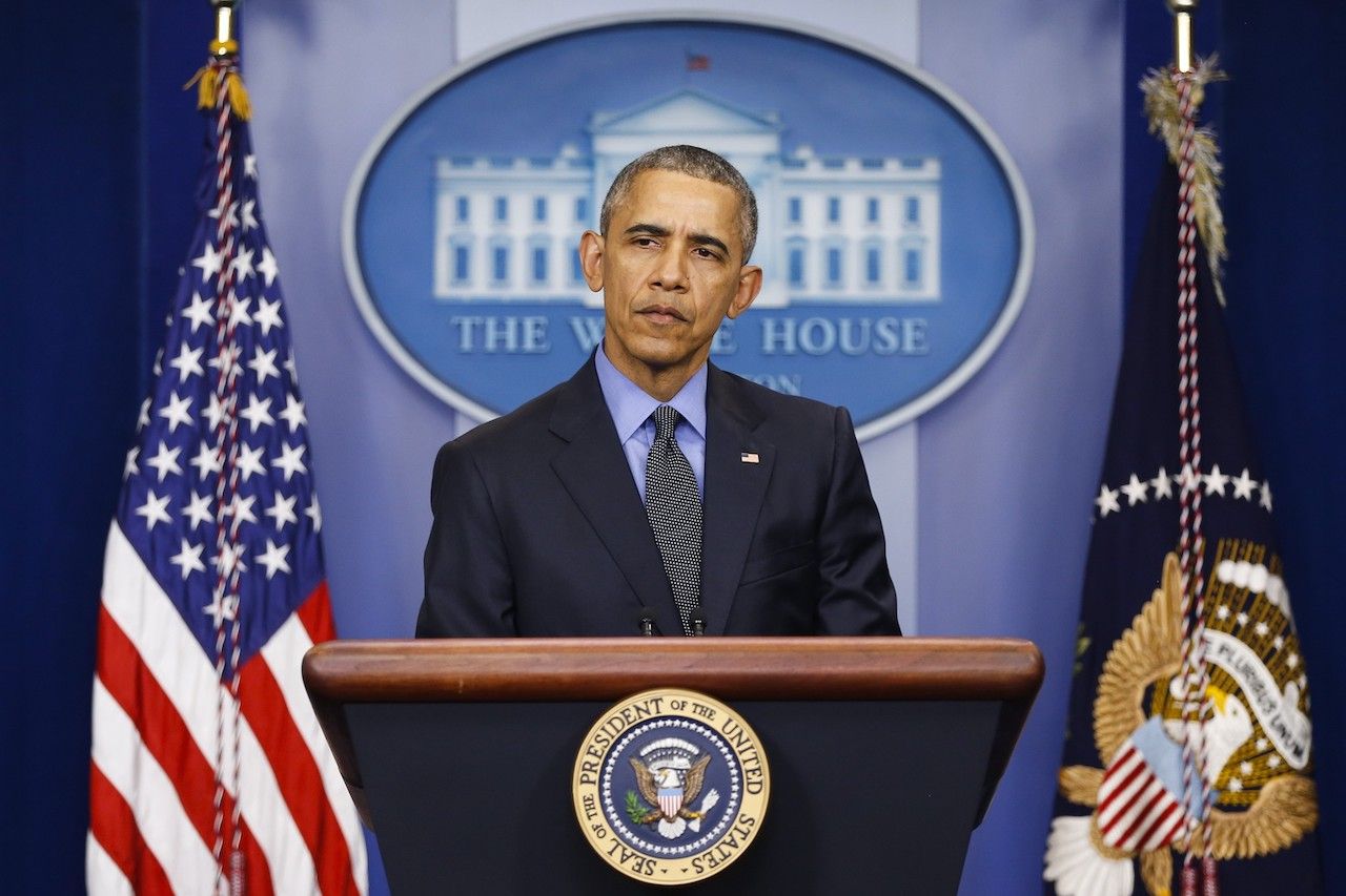 WASHINGTON, USA - DECEMBER 18: President Barack Obama listens to a question during his end of the year news conference in the Brady Press Briefing Room at the White House in Washington, USA on December 18, 2015. (Photo by Samuel Corum/Anadolu Agency/Getty Images)