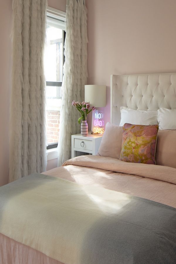 Kept simple, the textured curtains provide a hint of playfulness to the soft colours