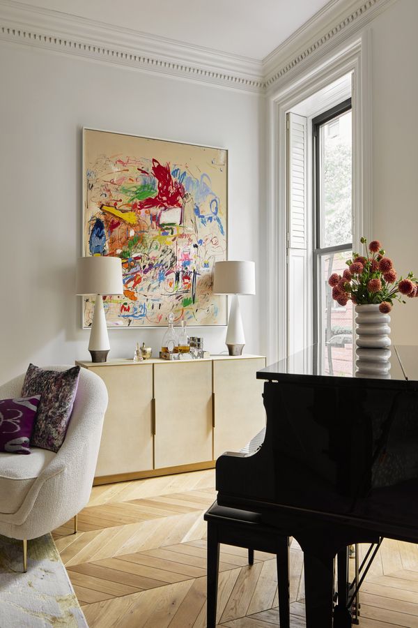 Most of the artwork and photographs around the house come from the family’s personal collection