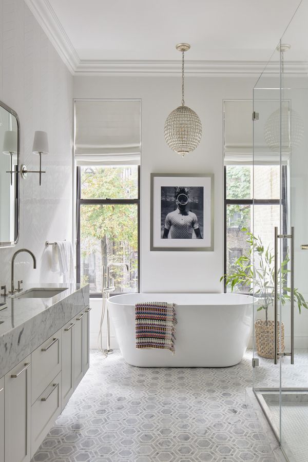 Despite its strange location, the photograph in the bathroom comes from Boozer’s personal collection