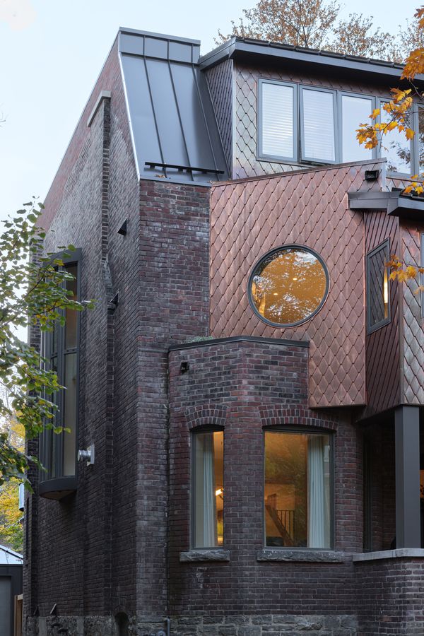 The mansard roof and quirky front facade are iconic features of their time, now given a modern twist