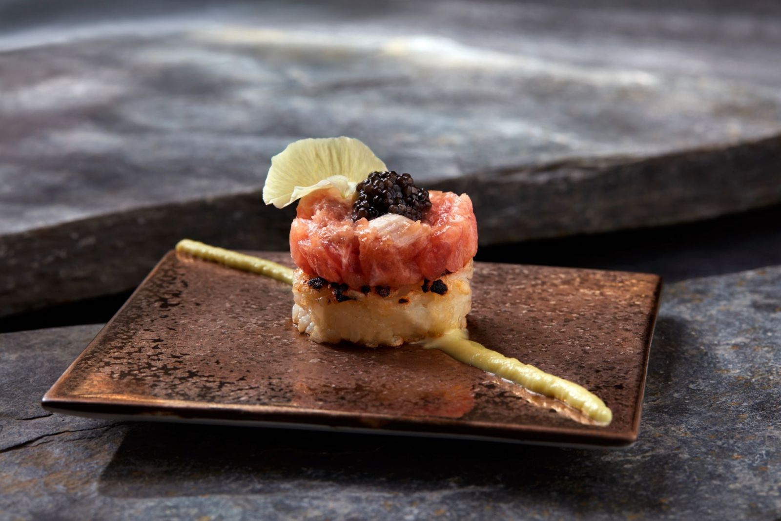 The signature Negitoro yakionigiri is grilled over Kishu binchō charcoal (Photo: Shin Terroir) best Japanese counter dining restaurants omakase kaiseki kappo sushiya singapore