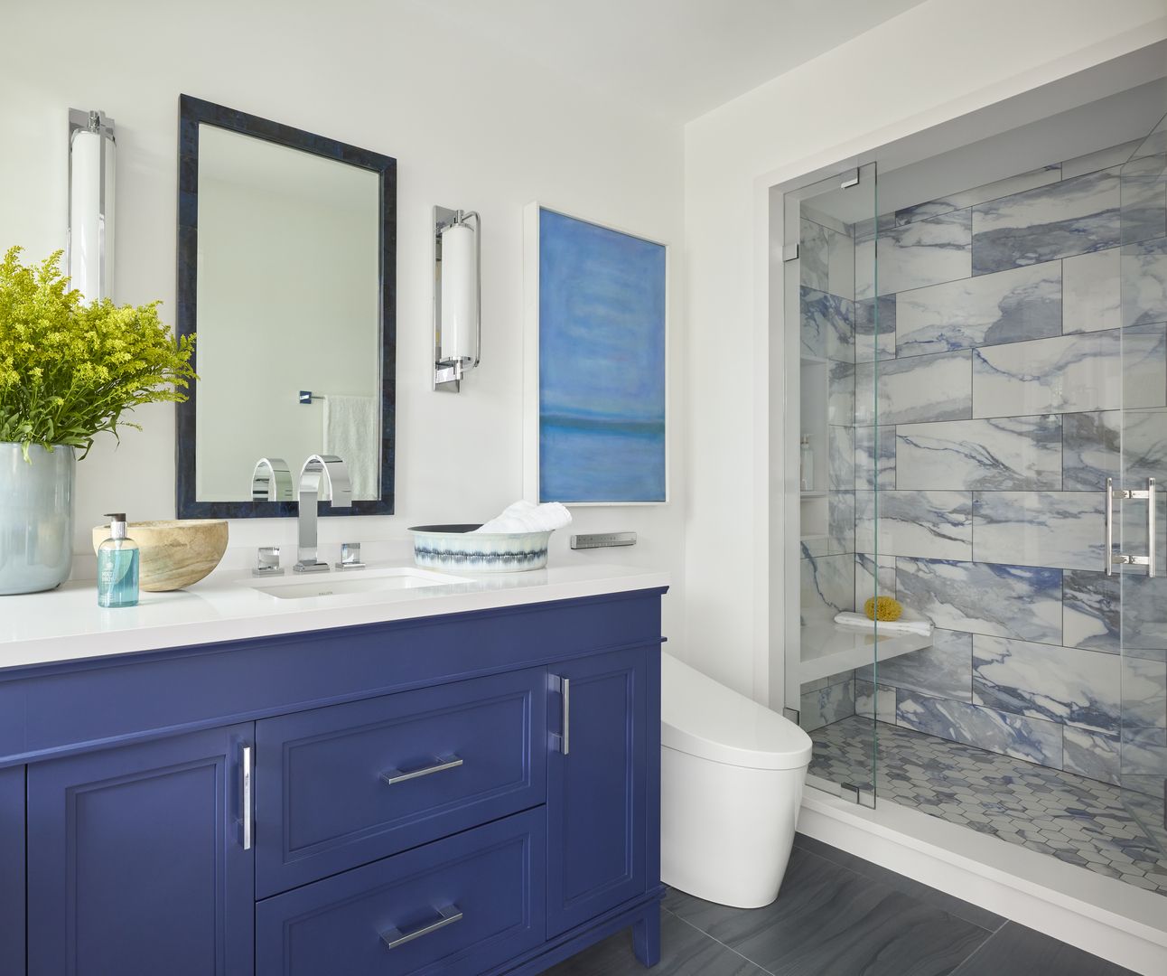 The nautical vibes are apparent in the guest bathroom