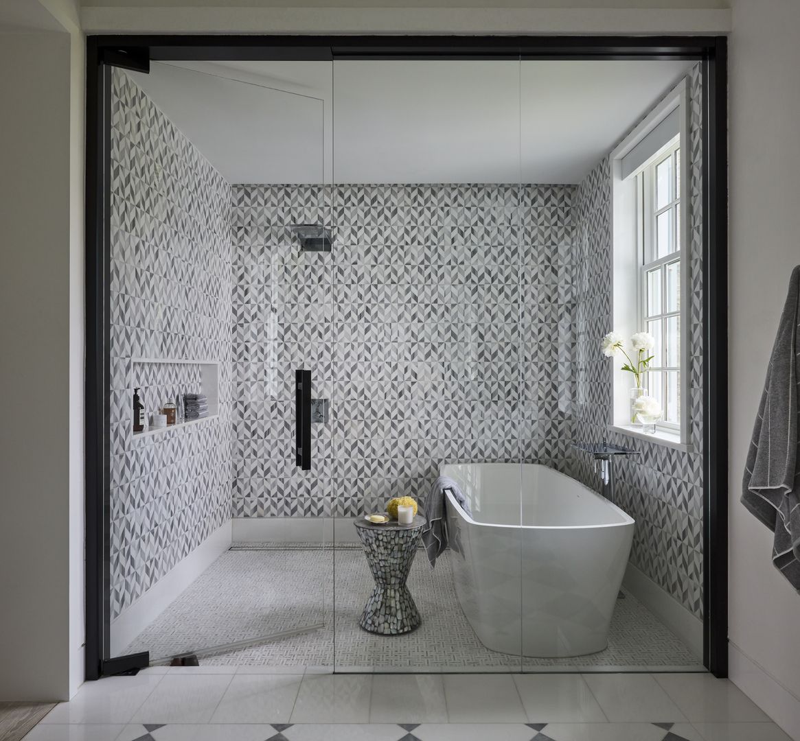 The soaking tub and rainfall shower make the ultimate relaxation space