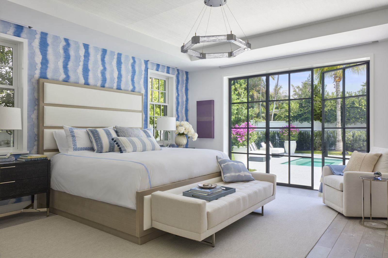 The blue hues of the master bedroom bring in the sea vibes