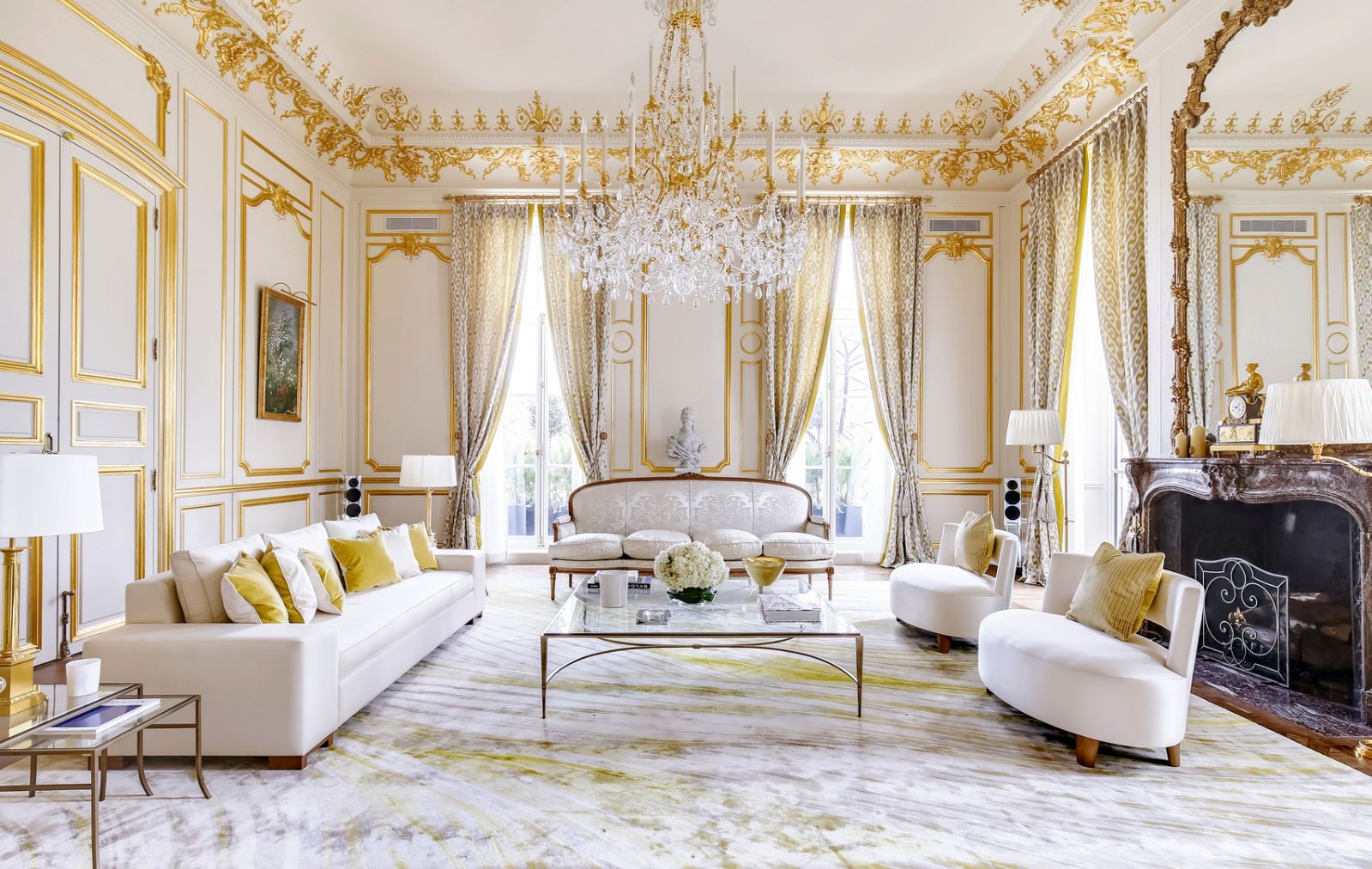 Gold accents and details add to the luxury of the living room