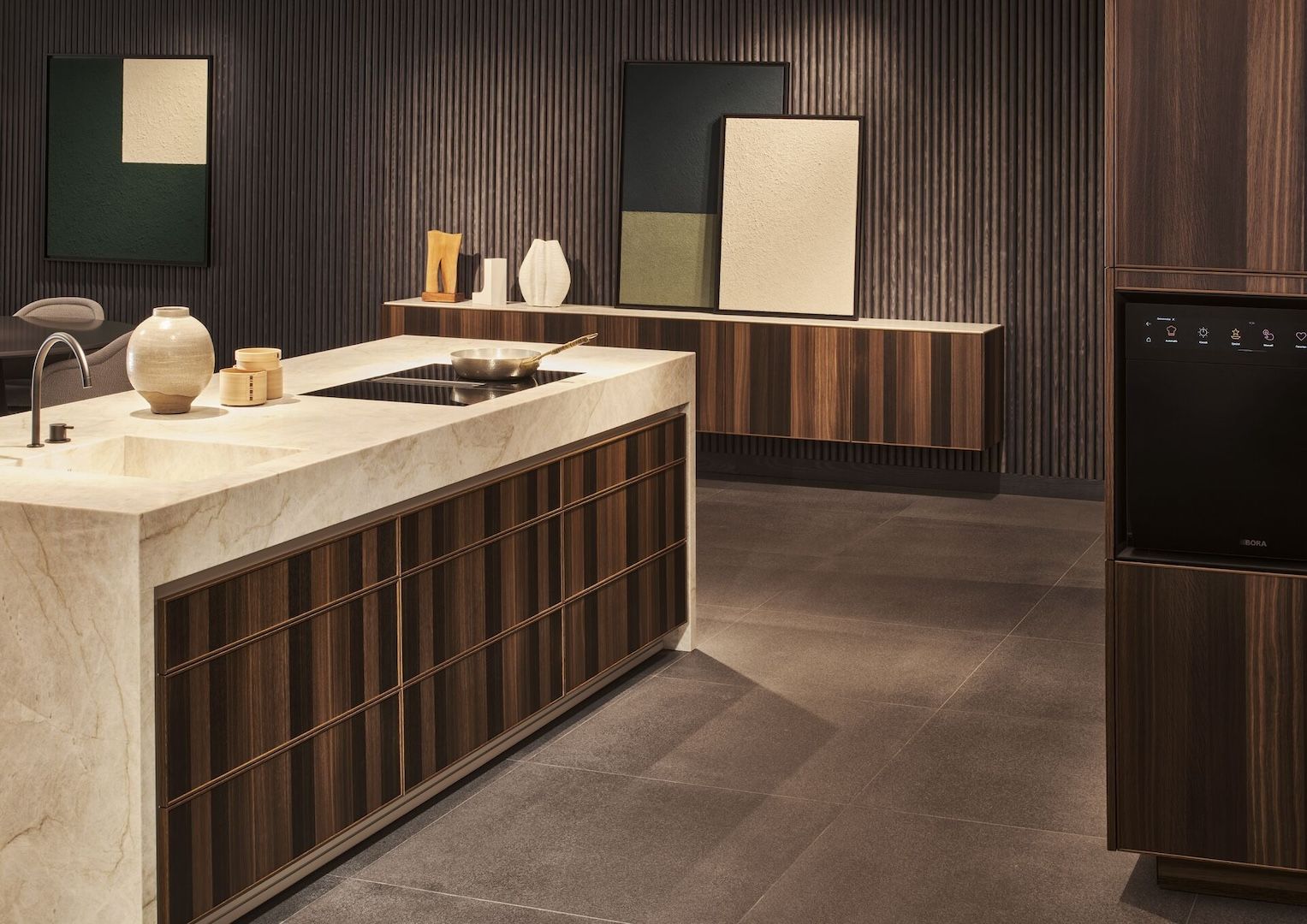 +Segmento cabinets are handleless to provide clean and relaxing lines