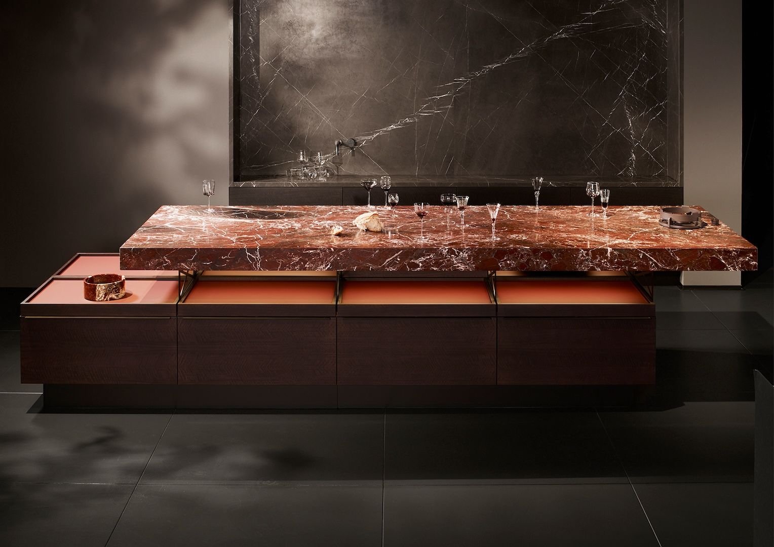 The atmospheric mix of dark reds in the natural stone evokes a whisper of the Roman world and a life filled with joy and good food