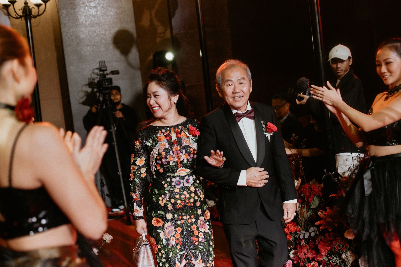 The groom's parents, Joanne Tan and David Auyong
