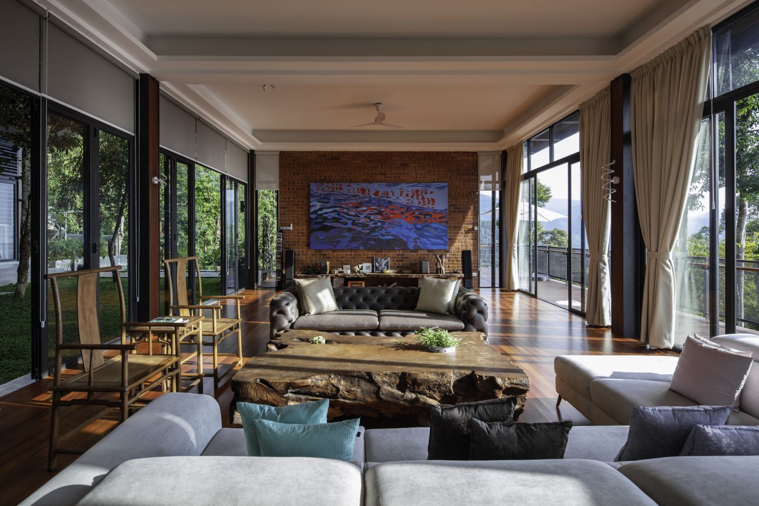 The owner’s eclectic furniture imbues the living room with plenty of personality (Photo: Lawrence Choo)