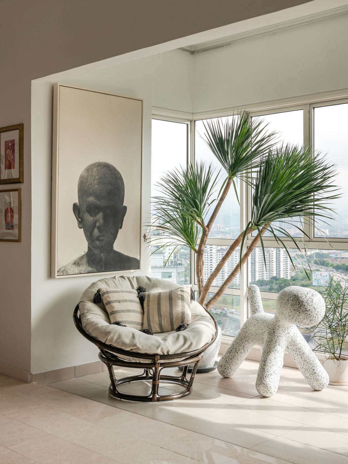he opened up lanai is now home to a giant Magis dog, a Papasan chair and Ronnie Mohamad’s charcoal artwork (Photo: David Yeow)