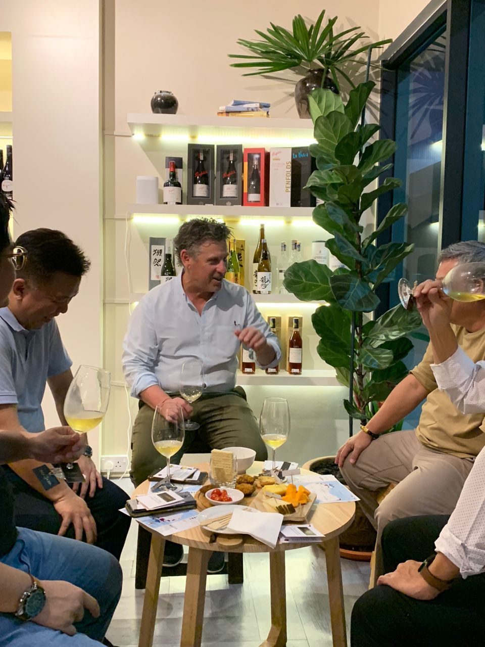 Stansborough with fellow wine lovers at a wine tasting in Kota Kinabalu