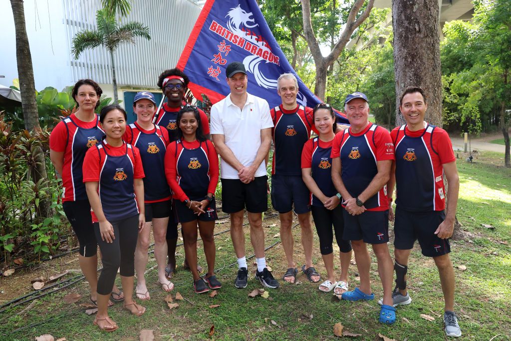 Prince William, Prince of Wales poses with members of the British Dragons dragon boating club on day two of his visit to Singapore on November 06, 2023 in Singapore. The Prince of Wales is visiting Singapore to attend the Earthshot Prize Awards and will also carry out several engagements related to environmental issues. (Photo by Chris Jackson/Getty Images)