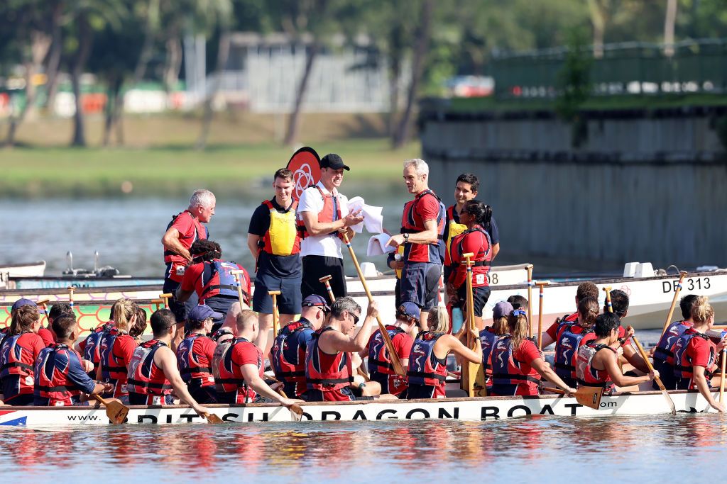 SINGAPORE, SINGAPORE - NOVEMBER 06: Prince William, Prince of Wales speaks to members of the British Dragons dragon boating club on the Kallang River on day two of his visit to Singapore on November 06, 2023 in Singapore. The Prince of Wales is visiting Singapore to attend the Earthshot Prize Awards and will also carry out several engagements related to environmental issues. (Photo by Chris Jackson/Getty Images)