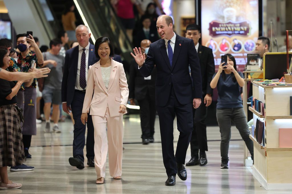 SINGAPORE, SINGAPORE - NOVEMBER 05: Prince William, Prince of Wales and Sim Ann, Senior Minister of State for Foreign Affairs and Senior Minister of State for National Development greet members of the public during his visit to Jewel Changi Airport on day one of his visit to Singapore on November 05, 2023 in Singapore. The Prince of Wales is visiting Singapore to attend the Earthshot Prize Awards and will also carry out several engagements related to environmental issues. (Photo by Chris Jackson/Getty Image